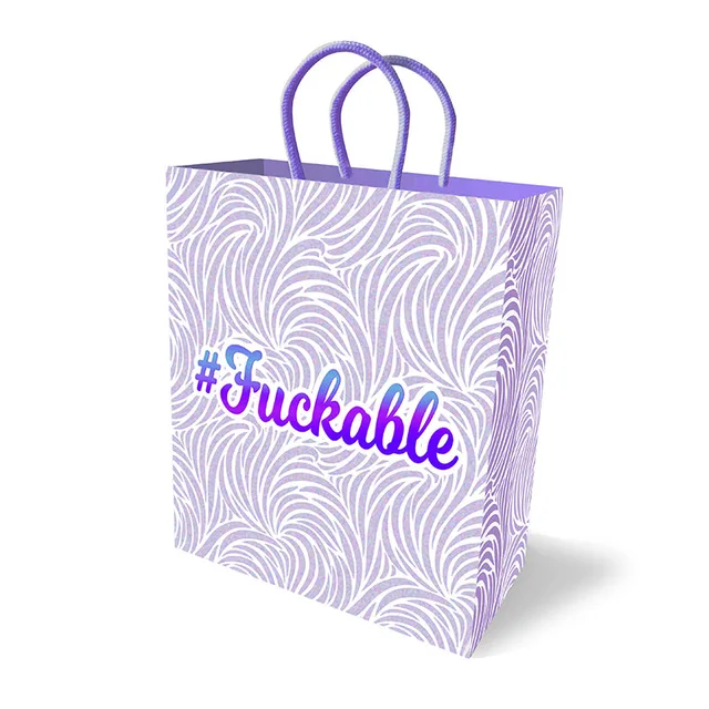 White and purple Fuckable gift bag with wavy pattern and loop handles