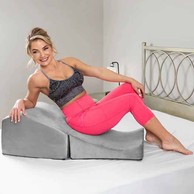 Liberator Flip Ramp Lush Grey positioning pillow seated lifestyle view with the two pieces stacked