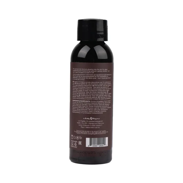 Back label of Earthly Body Beach Daze 2 oz massage oil bottle