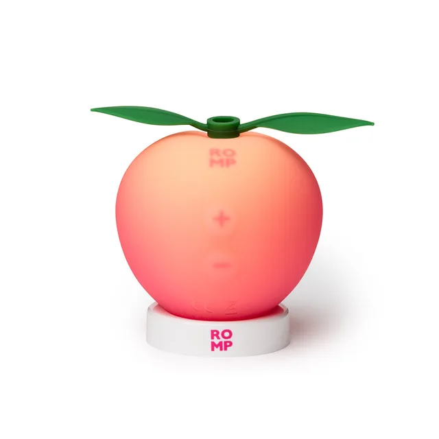 Pink Peach on white stand with green leaf top