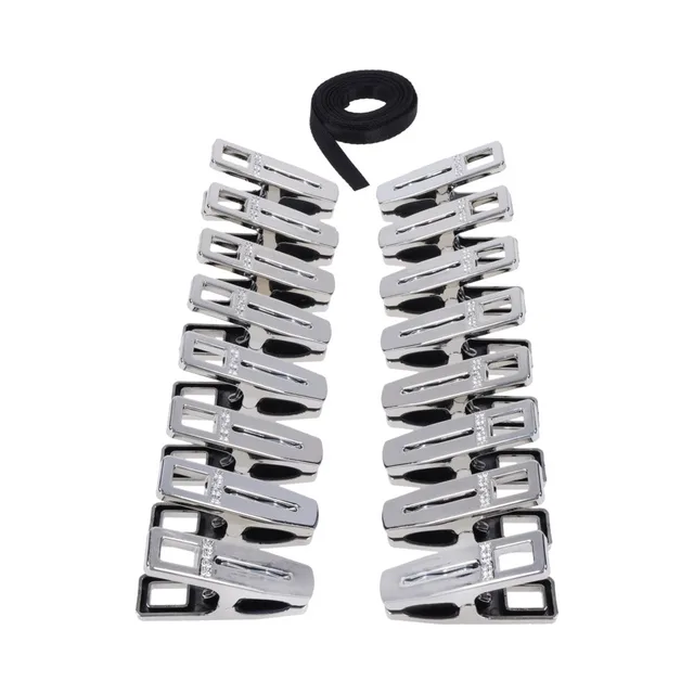 Two rows of silver Sportsheets Edge clothes pins with black cords