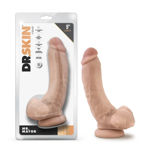 Blush Dr. Skin Mr. Mayor beige 9-inch curved TPE dildo beside front retail package