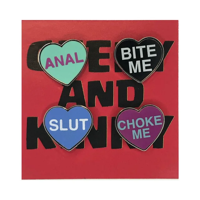 four Kinky Hearts pins reading Anal, Bite Me, Slut and Choke Me on red card