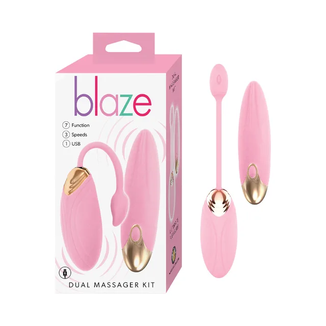 Pink Blaze dual massager kit beside matching retail box