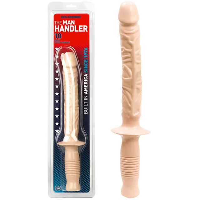 White Manhandler dildo beside red and blue retail package