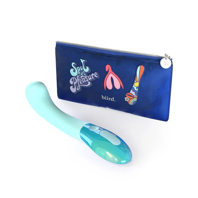 Mint Biird Gii Glow vibrator beside illustrated storage pouch
