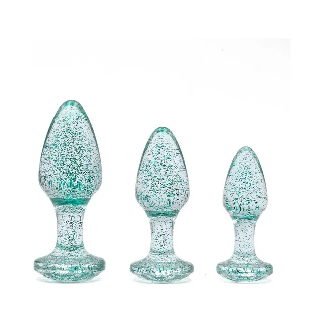 Adam & Eve blue glitter acrylic plug set three plugs arranged upright by size