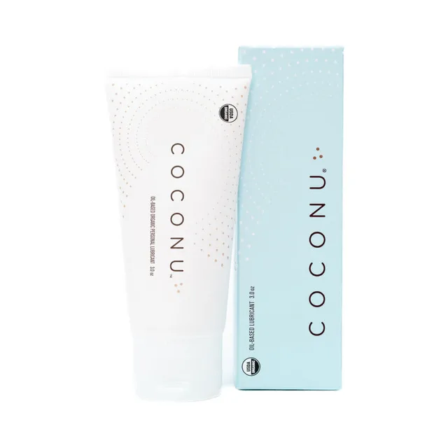 white Coconu oil-based lubricant tube beside a pale blue retail carton
