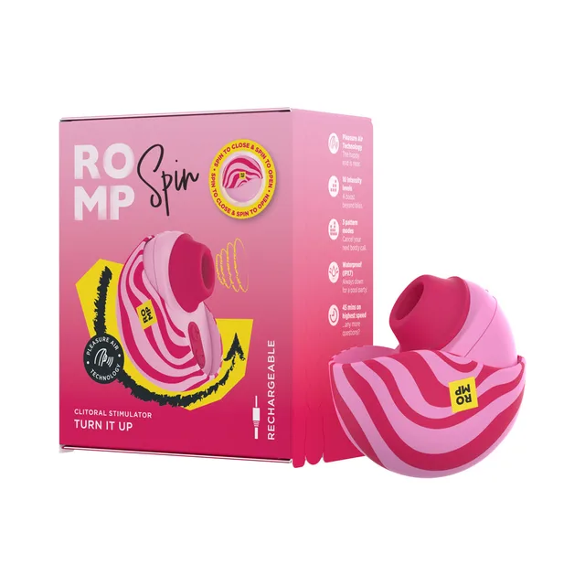 Pink ROMP Spin stimulator beside pink retail box