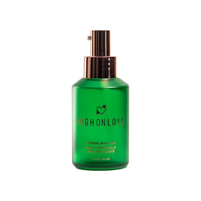 Green HighOnLove Firming Body Oil pump bottle with gold-tone dispenser