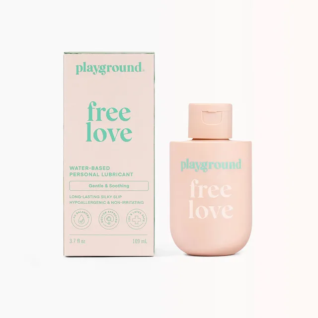 Playground Free Love 3.7 oz pale-pink bottle beside matching retail carton