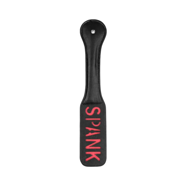 Black Ouch paddle with red SPANK lettering and rounded handle