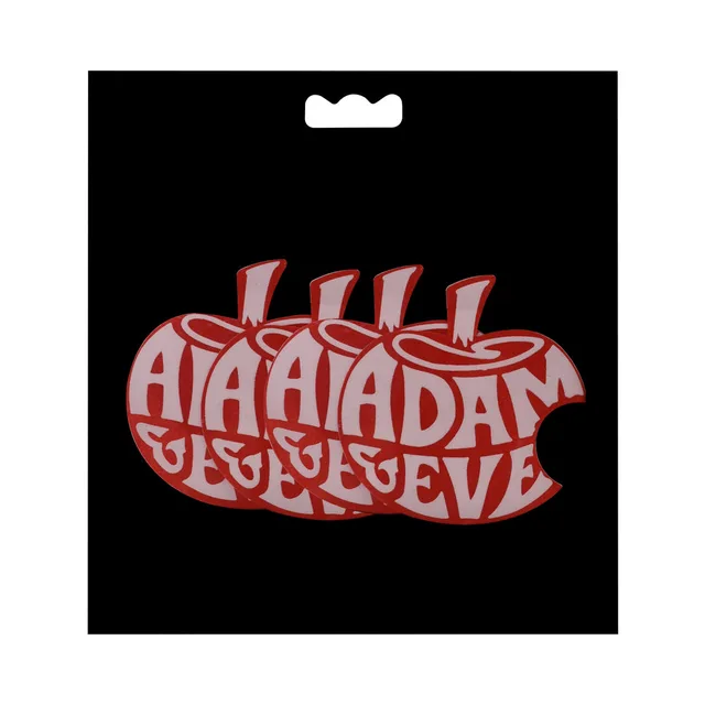 Black backing card with repeating red apple logos for Adam and Eve pasties