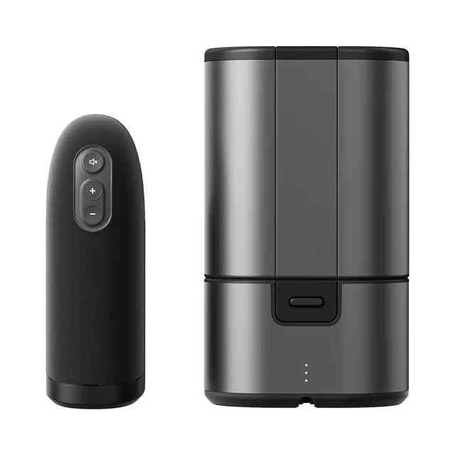 black Womanizer Premium 2 with control buttons beside Arcwave Ion storage base