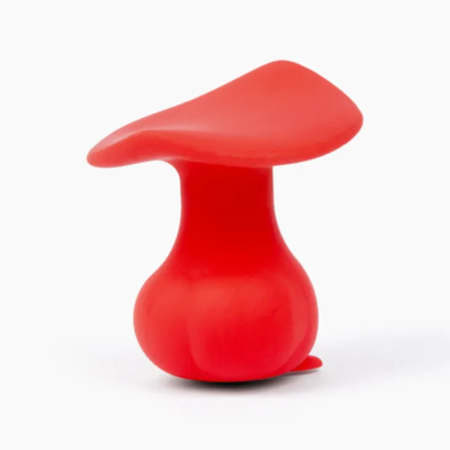 Side angle of red Morrie vibrator showing broad curved top