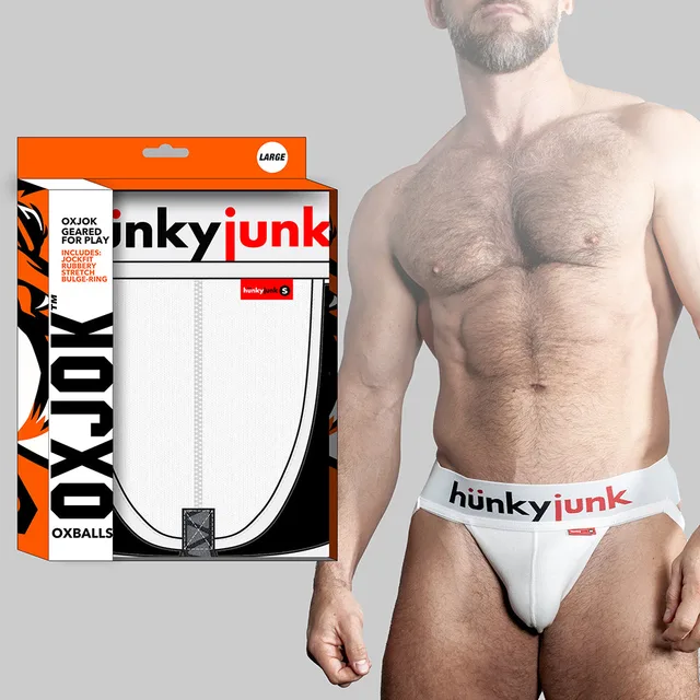 Oxballs Oxjok Hunker white jockstrap worn by model beside orange retail box