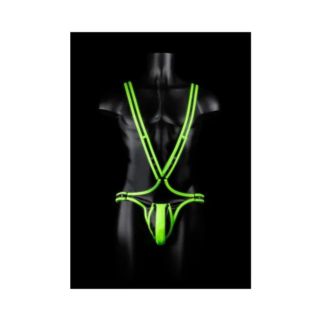 Neon-green full-body harness on black mannequin