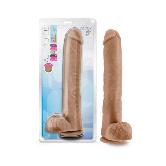 Au Naturel Daddy tan dildo beside clear retail package