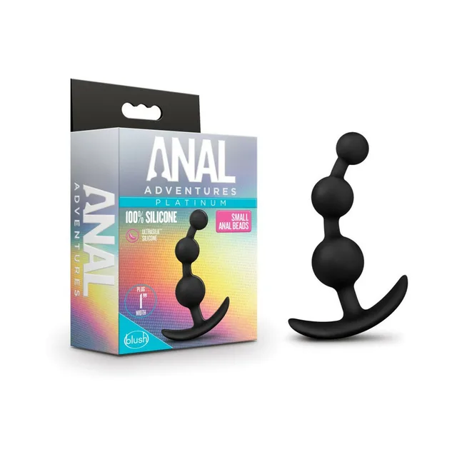 Small Platinum black anal beads beside retail box