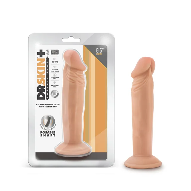 Beige Dr. Skin Plus 6-inch posable dildo beside retail package