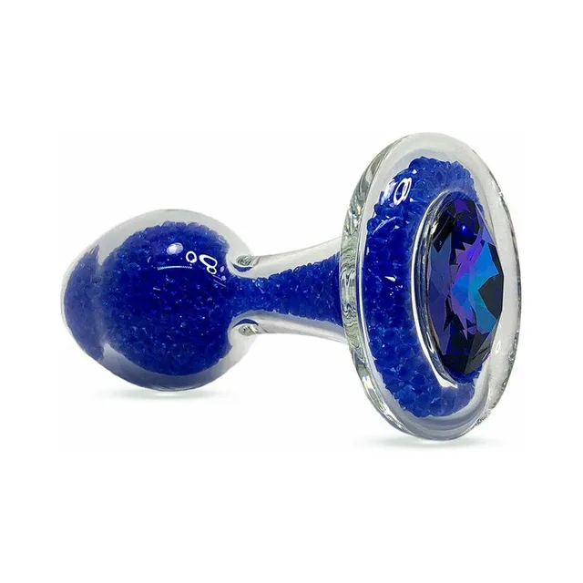 deep-blue sparkle glass plug with faceted blue gem in clear base