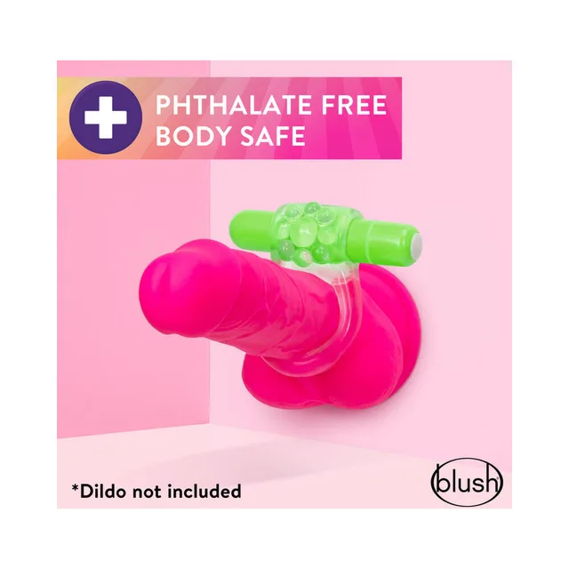 Green Teaser C-ring positioned on a pink dildo display