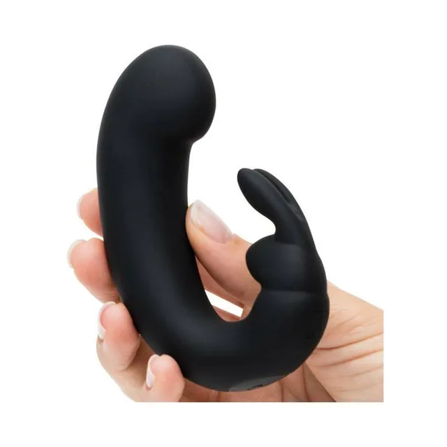 Black Fifty Shades Sensation rabbit vibrator held in hand