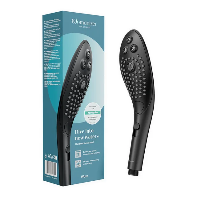 black Womanizer Wave shower head with controls beside teal box