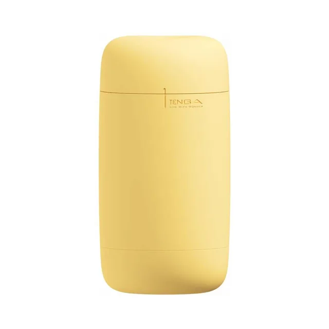 Custard-yellow rectangular Tenga Puffy stroker case on white background