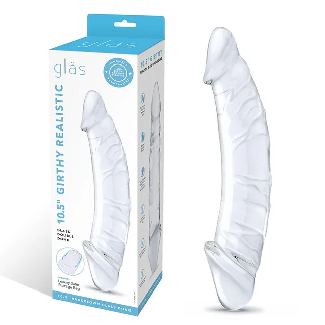 Clear Glas double dildo standing beside its package