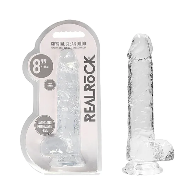 Clear RealRock Crystal Clear 8-inch dildo beside retail blister