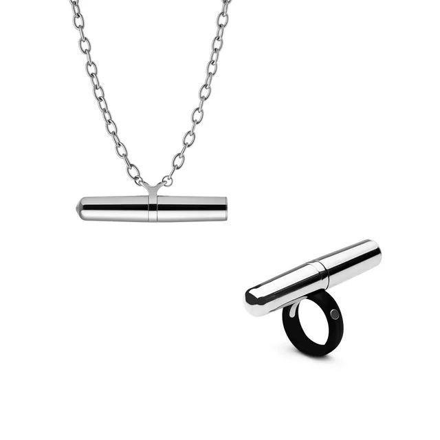Crave Tease silver necklace and ring vibrator collection with cylindrical pendant on chain and black ring attachment