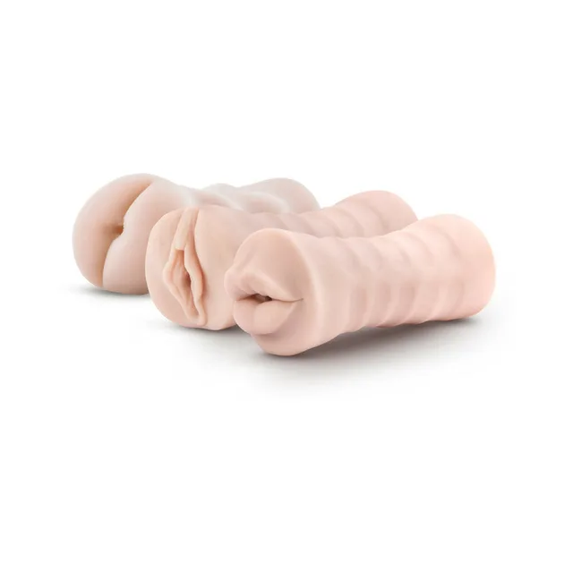 Three beige stroker sleeves with different molded openings