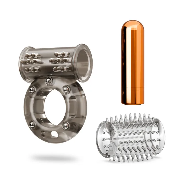 Blush Stay Hard vibrating ring set 3 components separated beside a copper-tone bullet
