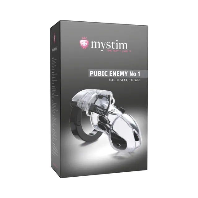Mystim Pubic Enemy No. 1 clear cage with silver-tone rings beside black retail box