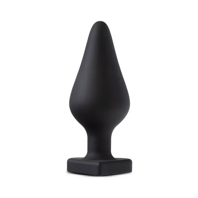 Front view of black tapered Temptasia plug with heart base