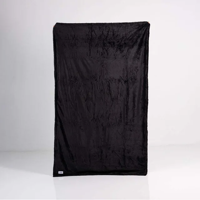 Splash Blanket Furlush large black blanket hanging full length on white background