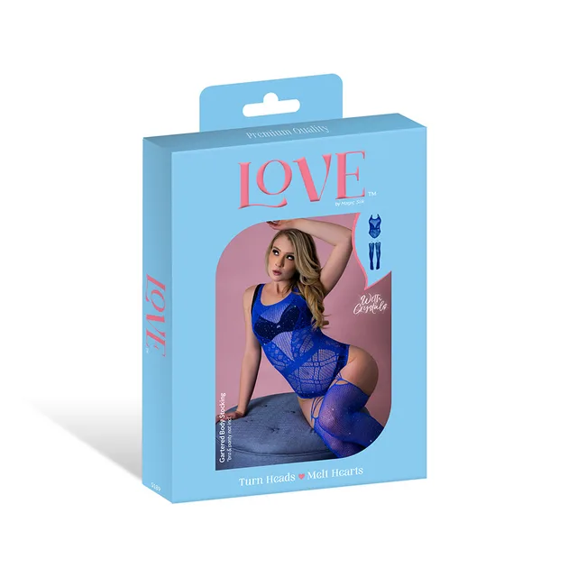 Magic Silk seamless blue gartered bodystocking displayed in blue retail packaging