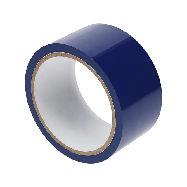 Angled view of glossy navy Ouch PVC tape roll with white core