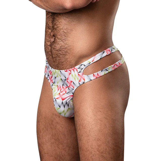 Male Power Cut It Out L/XL multicolor geometric cutout thong side view worn by model