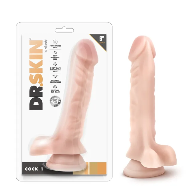 Dr. Skin Cock 1 Beige 9 Inch Dildo beside white Dr Skin retail blister