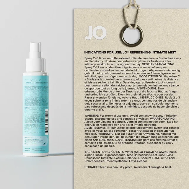 Rear label of JO Balance bottle beside printed information card