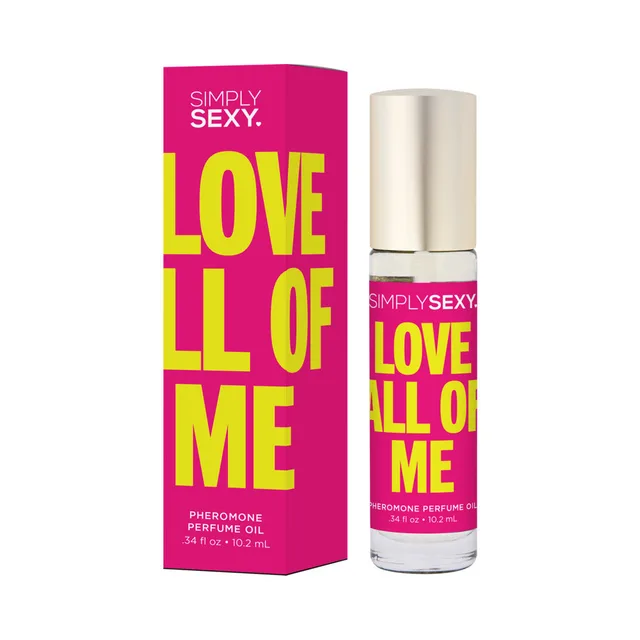 Love All Of Me perfume oil roll-on beside magenta box with yellow lettering