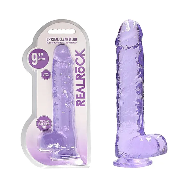 Purple RealRock Crystal Clear 9-inch dildo beside blister pack
