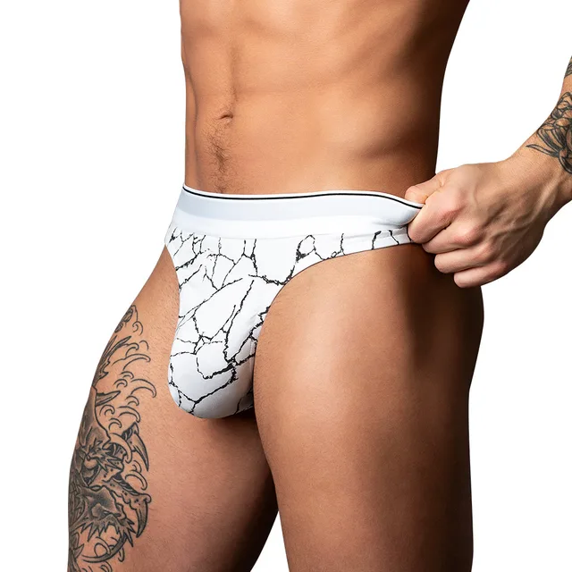 Male Power Soo Cumfy L/XL black and white thong front view worn by model