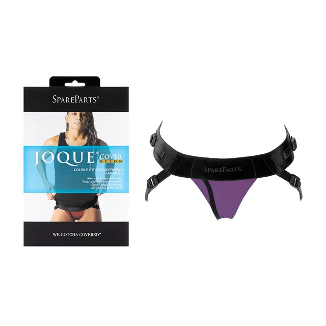 purple and black Size B SpareParts Joque Cover double-strap harness beside package