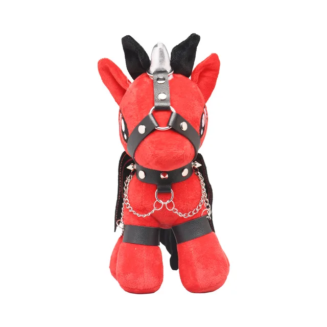 Front view of red pony with black harness and silver chains