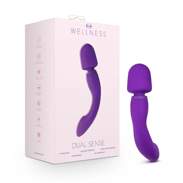 Purple Wellness Dual Sense vibrator beside retail package