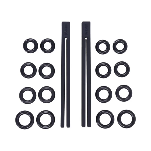 Two black silicone rods with multiple adjustment rings laid out