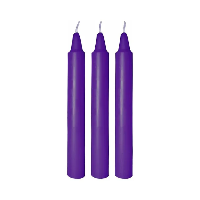 Three loose purple Me You Us taper candles with white wicks